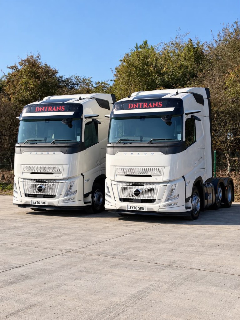 Two DNTRANS LTD Volvo FH trucks
